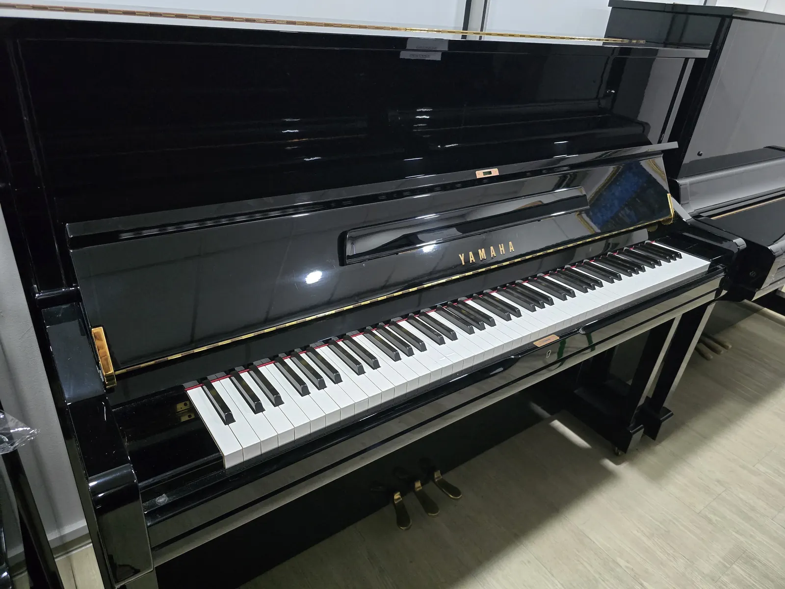Yamaha U1 upright piano in polished ebony at Zadok Music Shoppe Singapore