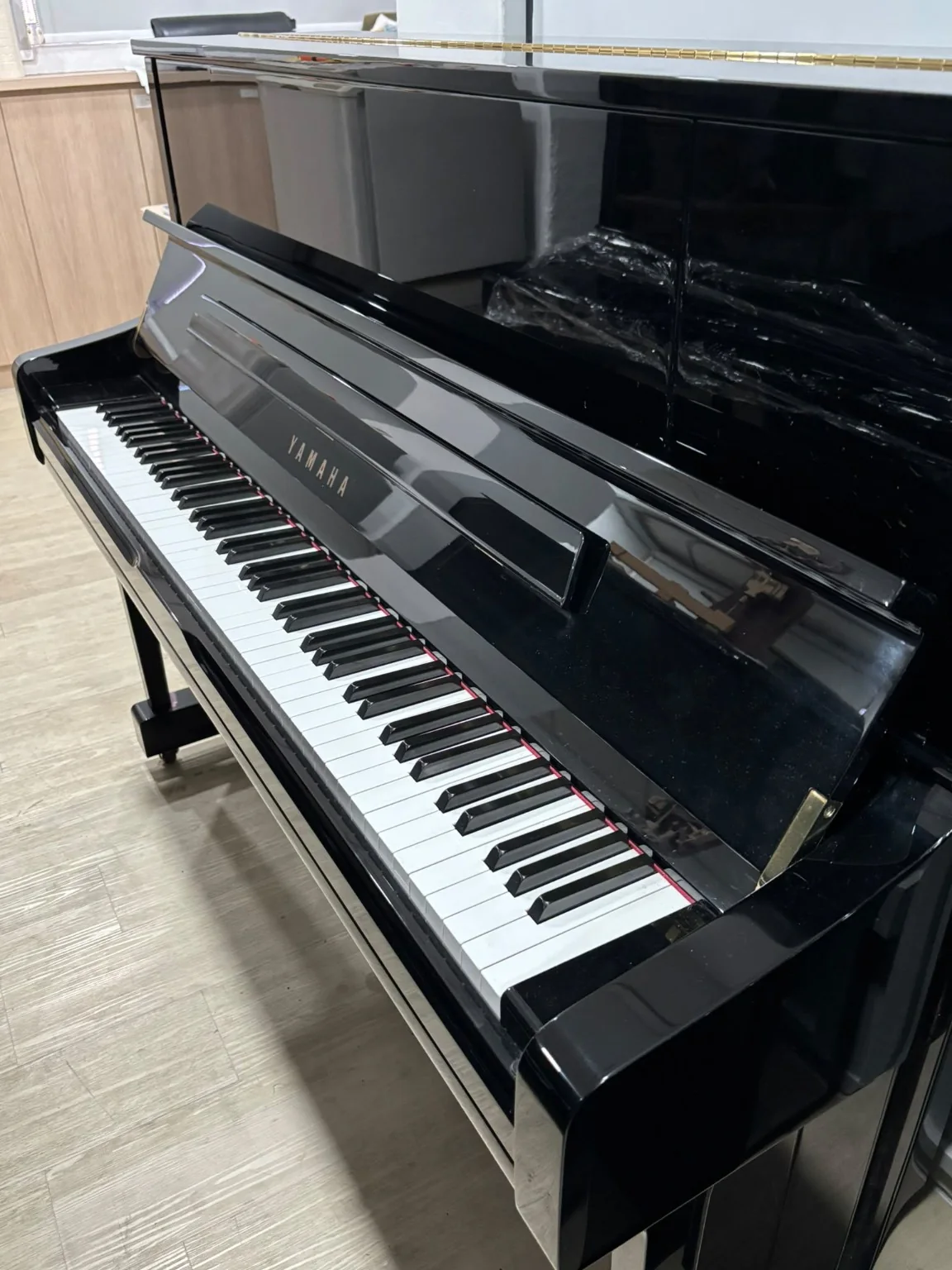 Yamaha U1J upright piano in polished ebony at Zadok Music Shoppe Singapore