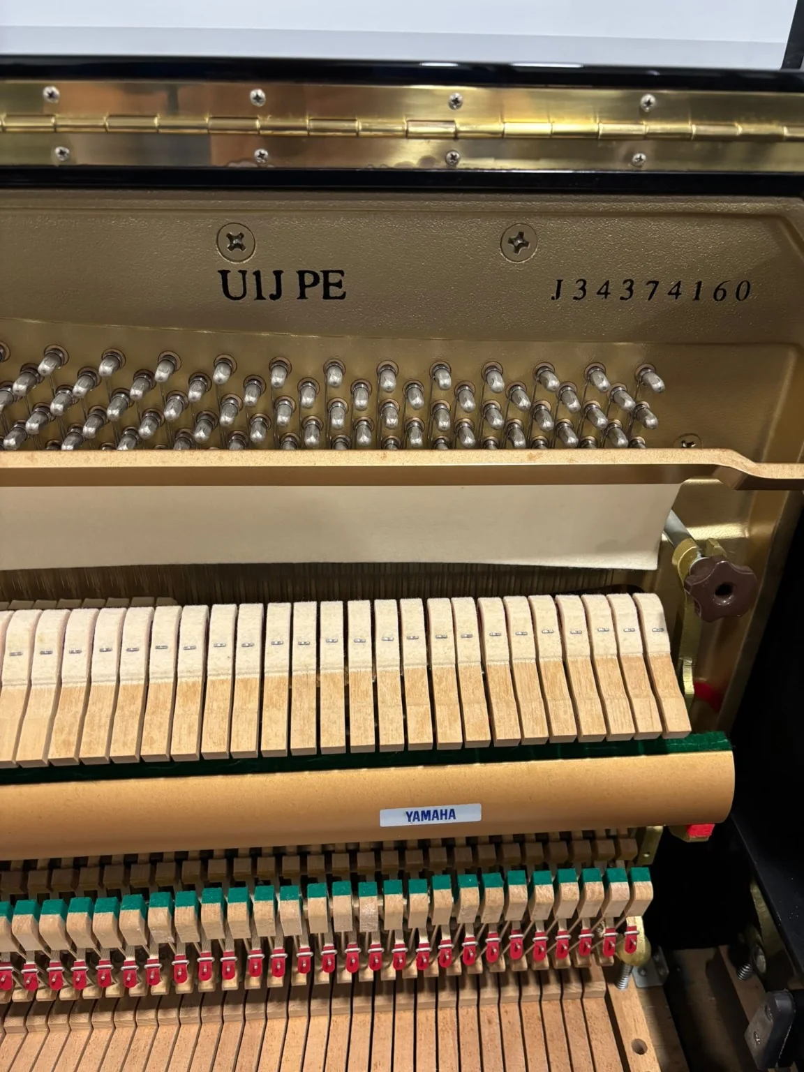 Yamaha U1J model and serial number J34374160 inside the piano