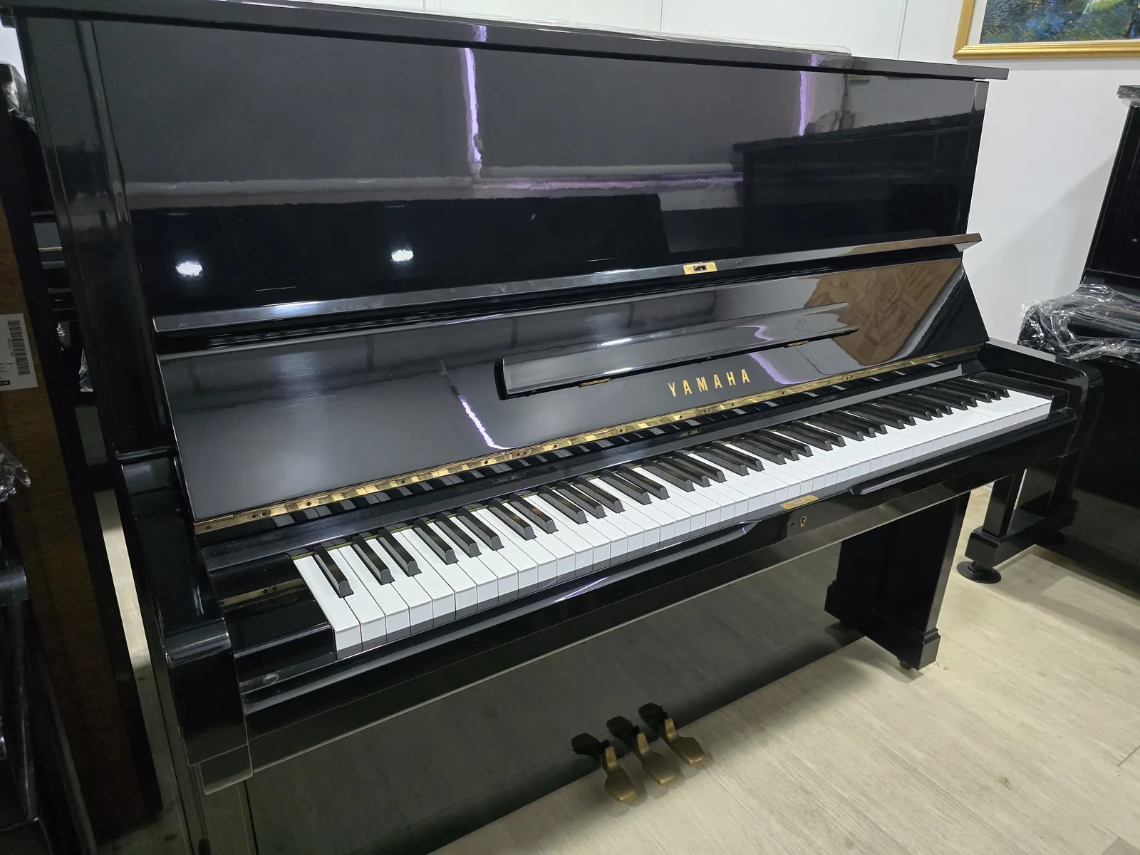 Yamaha U2H upright piano in polished ebony at Zadok Music Shoppe Singapore