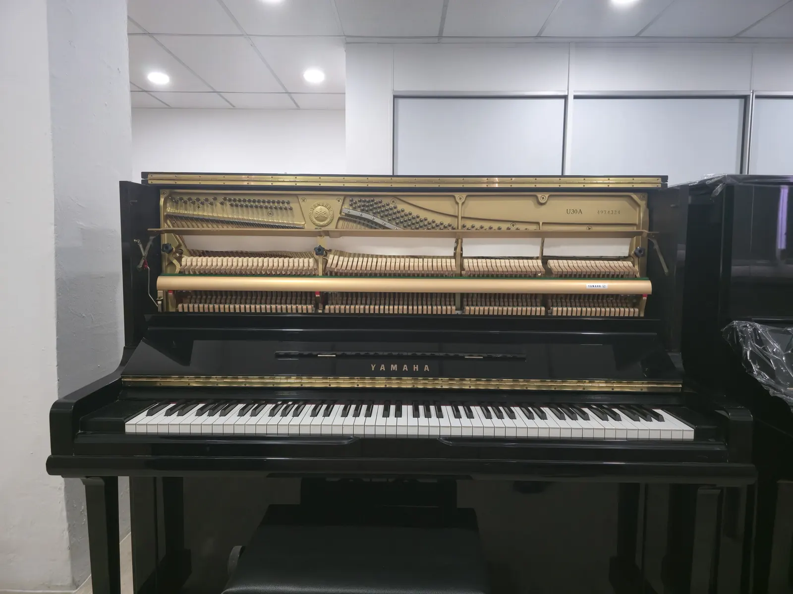Interior action and frame of Yamaha U30A upright piano