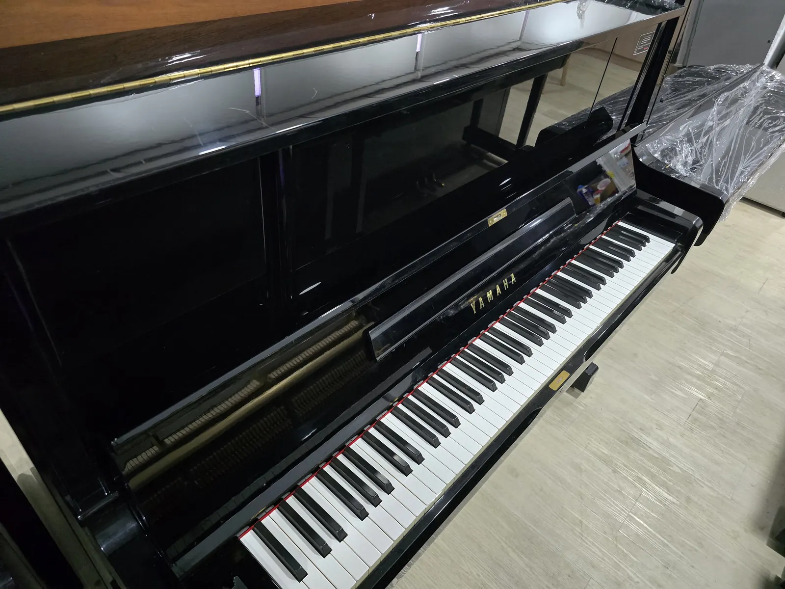 Yamaha UX1 upright piano in polished ebony at Zadok Music Shoppe Singapore