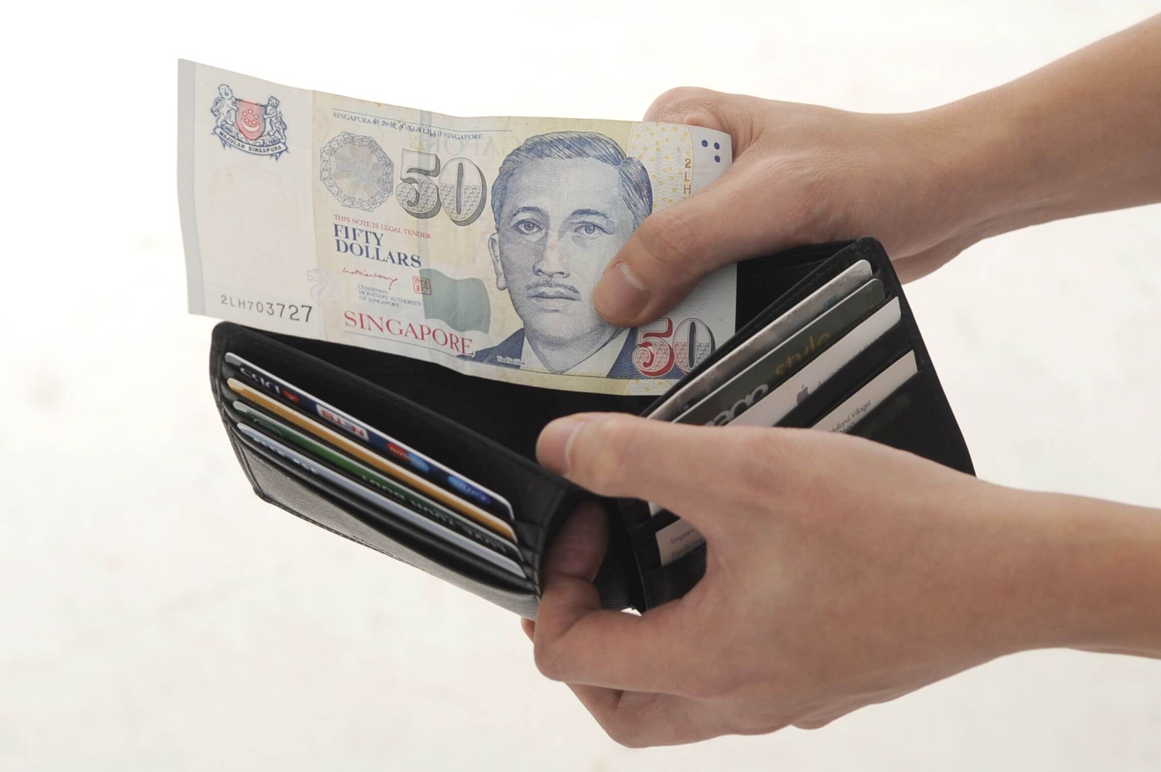 Singapore money in wallet